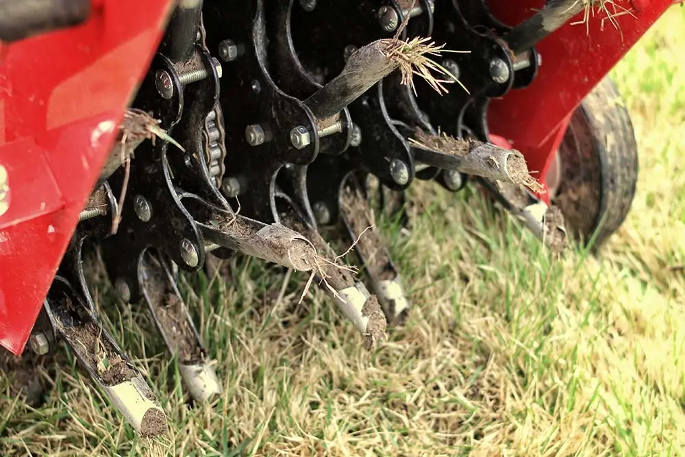 A lawn aeration machine aerating a Cascade, MI lawn.